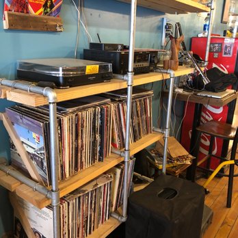 Distant Whistle Brewhouse - a record shelf full of vinyl records - Breweries Near Me - Vicksburg, Michigan Distant Whistle Brewhouse - a record shelf full of vinyl records - Breweries Near Me - Vicksburg, Michigan