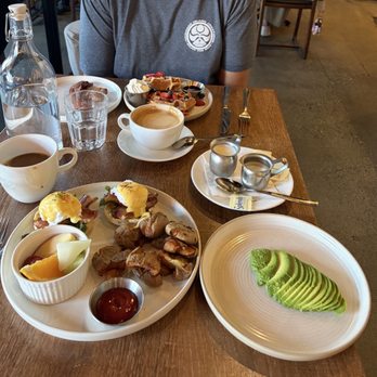 The Story Cafe - Fly me to the Bennie's with added avocado, caramel late, black coffee, waffles two - Pizza Near Me - Richmond, British Columbia The Story Cafe - Fly me to the Bennie's with added avocado, caramel late, black coffee, waffles two - Pizza Near Me - Richmond, British Columbia