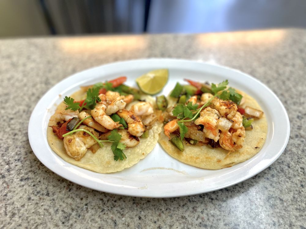 Tacos Y Pupusas