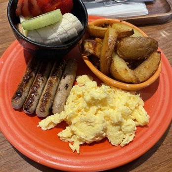 Eight AM - Eggs and sausage with potatoes and fresh fruit mix. - New American Near Me - San Francisco, California Eight AM - Eggs and sausage with potatoes and fresh fruit mix. - New American Near Me - San Francisco, California