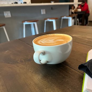 Social Grounds Coffee - Large latte with whole milk and toffee nut flavor. - Coffee & Tea Near Me - Jacksonville, Florida