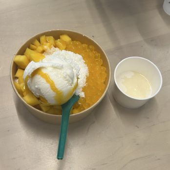 Cream de la Cream - Mango bingsoo (shaved ice) with condensed milk on the side. - Ice Cream & Frozen Yogurt Near Me - Tampa, Florida