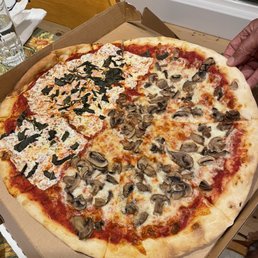 a pizza in a pizza box a pizza in a pizza box
