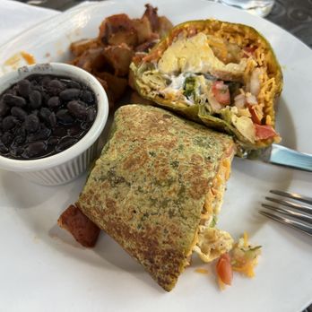 Flo - Flo's Original Burrito comes with beans and potatoes - Breakfast & Brunch Near Me - Chicago, Illinois