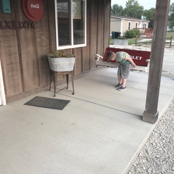 Firehouse 54 - a young boy on a porch - Pizza Near Me - Eagleville, Missouri