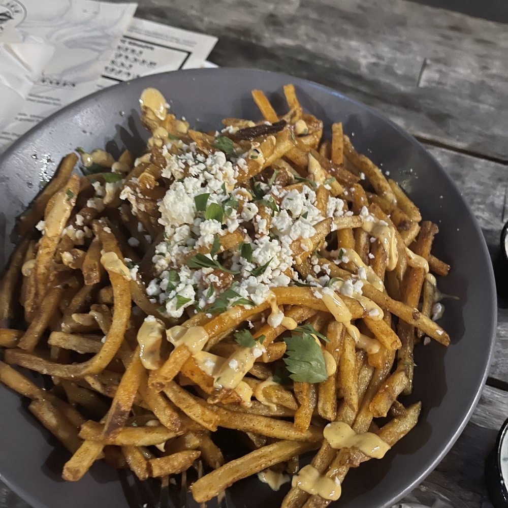 Squid Ink Eclectic Eats & Drinks - Mo Town Hot fries - Gastropubs Near Me - Mobile, Alabama