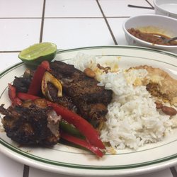Ventura Restaurant - Pork ribs with rice and beans and chk empanada