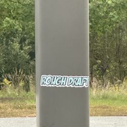 Dollar General - Sticker on the pole outside in the parking lot... makes sense. This whole dollar general is a "rough draft". The place is a zoo
