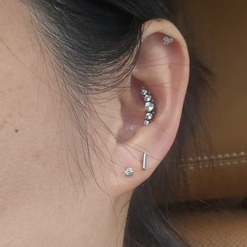Patriots Tattoo Piercing - Conch with cascade - Tattoo Near Me - Fairfax, Virginia Patriots Tattoo Piercing - Conch with cascade - Tattoo Near Me - Fairfax, Virginia