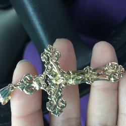 Boggs Jewelry - Had this fixed for my dad and it came out beautifully !  Over the years Jesus had broken away from the crucifix and the bale also cracked.