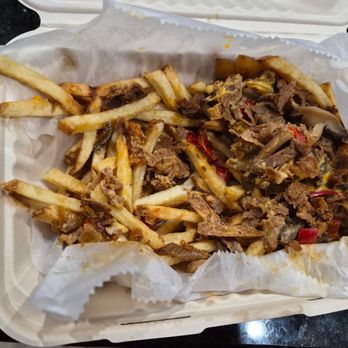 The Sloop - Cheesesteak fries- amazing - Sports Bars Near Me - Gulf Shores, Alabama The Sloop - Cheesesteak fries- amazing - Sports Bars Near Me - Gulf Shores, Alabama
