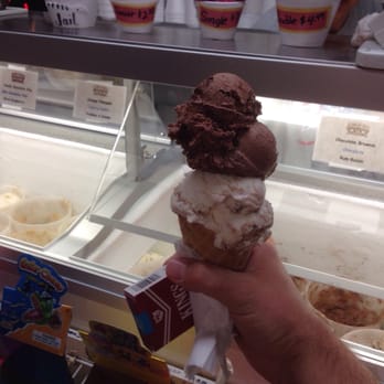 The Candy Kitchen - Chocolate Brownie on top and Malt Fudge Swirl on bottom. That's a single by the way! Candy cigarettes also in my hand. - Candy Stores Near Me - Madeira Beach, Florida