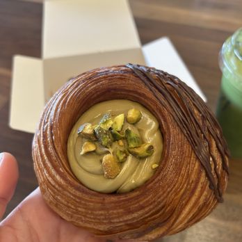 Ced Coffee & Donut - Pistachio croissant--so beautiful but I wish the cream was evenly spread in the bread to be more enjoyable - Coffee & Tea Near Me - Westminster, California Ced Coffee & Donut - Pistachio croissant--so beautiful but I wish the cream was evenly spread in the bread to be more enjoyable - Coffee & Tea Near Me - Westminster, California