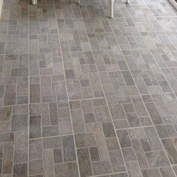Elite handyman services - a tile floor - Handyman Near Me