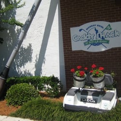 Golf cart crashed into front of bldg.
