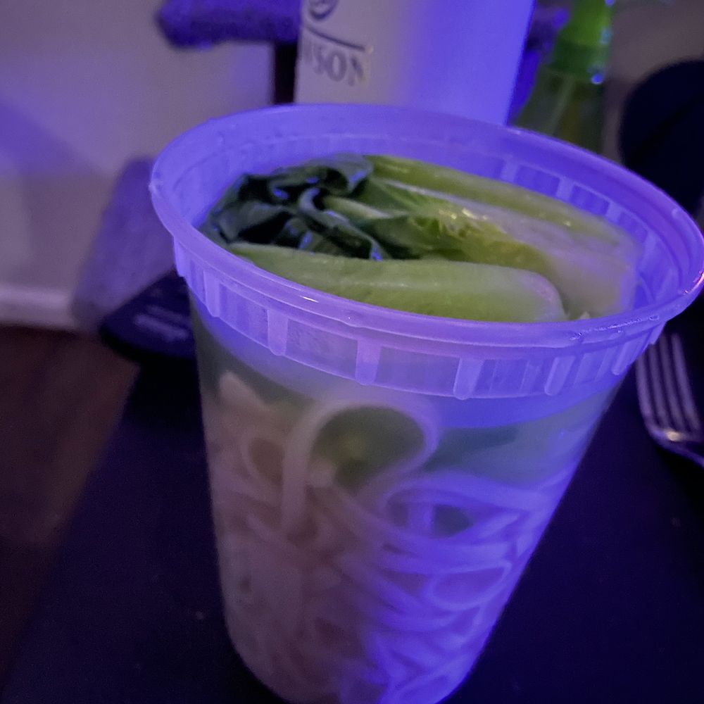 a cup of noodles and cucumbers a cup of noodles and cucumbers