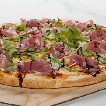 Pizzaville - a pizza on a wooden board - Pizza Near Me - Georgina, Ontario Pizzaville - a pizza on a wooden board - Pizza Near Me - Georgina, Ontario