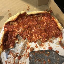 Gusano's Chicago Style Pizzeria - One topping half cooked pizza