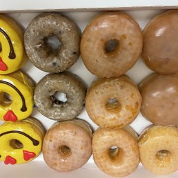 Raspberry Jelly Filled, Glazed Doughnuts, Blueberry Cake Doughnuts & Emoji Doughnuts.