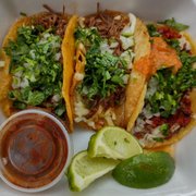 Photo of Tuetano Taqueria - San Diego, CA, United States. Left to right... Birria, Quesabirria, Longaniza tacos