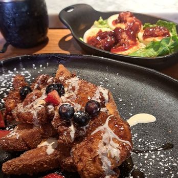 Honey Uninhibited - Covington - Sweetchick French toast with Berries and a chicken thigh with honey. Deviled eggs with chicken and BBQ sauce. Honey mule on the side. - Breakfast & Brunch Near Me - Covington, Kentucky Honey Uninhibited - Covington - Sweetchick French toast with Berries and a chicken thigh with honey. Deviled eggs with chicken and BBQ sauce. Honey mule on the side. - Breakfast & Brunch Near Me - Covington, Kentucky