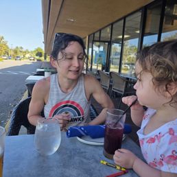 My wife and daughter enjoying the chicha morado.