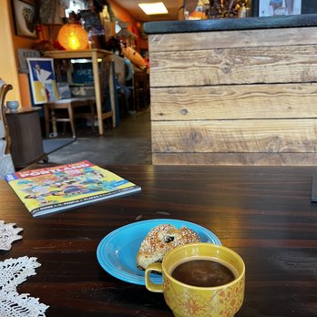 Jezebel's Last Standing Merrygoround Cafe - Americano with homemade cardamon and an awesome stuffed breakfast croissant. - Cafes Near Me - Portland, Oregon Jezebel's Last Standing Merrygoround Cafe - Americano with homemade cardamon and an awesome stuffed breakfast croissant. - Cafes Near Me - Portland, Oregon