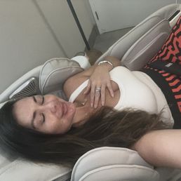 Decompressing at the massage chair waiting for my Iv .