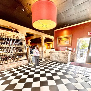 Tucker's Restaurant - Entrance to Tuckers-  I do Recommend cleaning the bugs out of the giant shade hanging in the foyer area. - Bars Near Me - Anderson, South Carolina