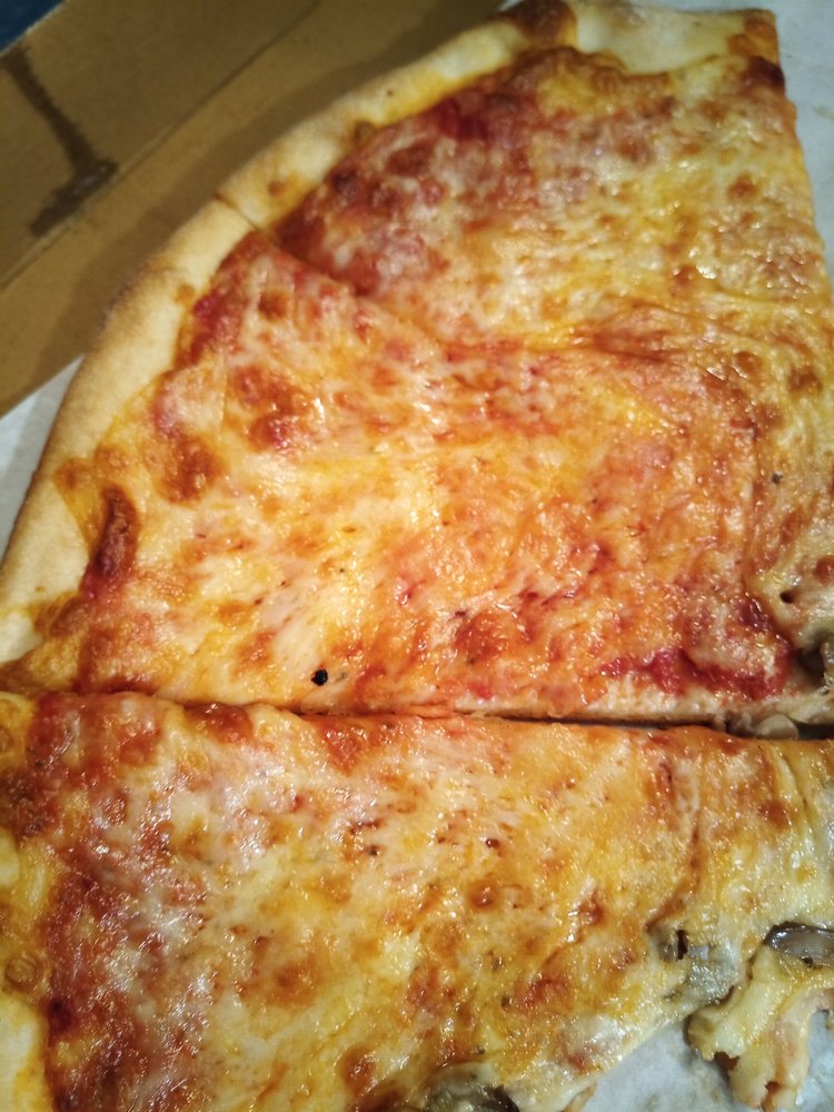 GINO’S PIZZERIA Updated October 2024 29 Photos & 96 Reviews 22 W