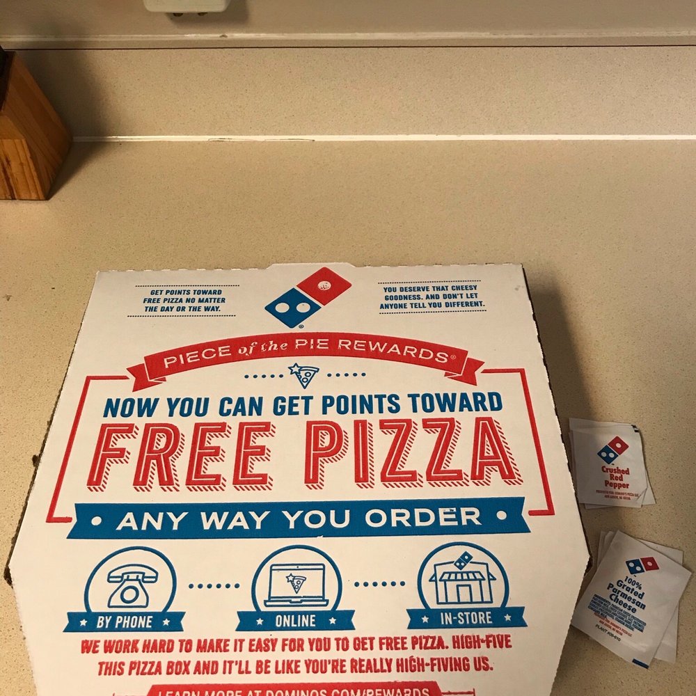Domino's Pizza - a pizza box on a counter - Pizza Near Me - Frisco, Texas Domino's Pizza - a pizza box on a counter - Pizza Near Me - Frisco, Texas