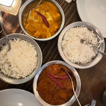 Atithi Indian Cuisine - Spicy chicken vindaloo (lower right) - SO spicy Paneer (top left) - Indian Near Me - Brooklyn, New York