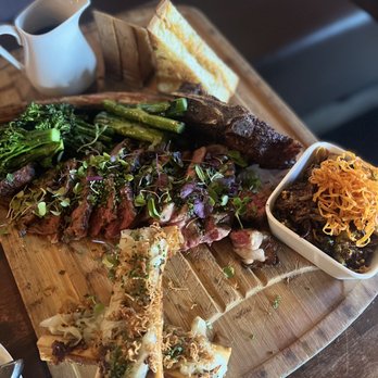 Social - Tomahawk with broccolini, Brussels sprouts and bone marrow - New American Near Me - Costa Mesa, California Social - Tomahawk with broccolini, Brussels sprouts and bone marrow - New American Near Me - Costa Mesa, California
