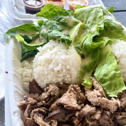 Steak plate with a choice of White Rice and tossed greens with Italian dressing.