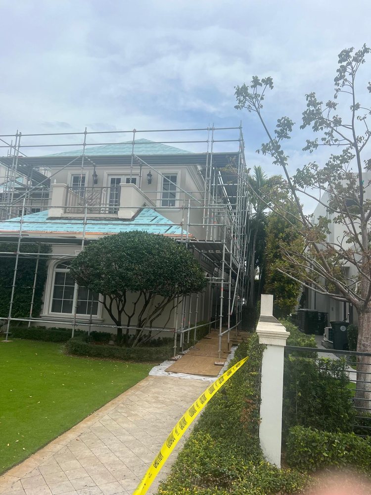 Slide of CA Roofing & Construction