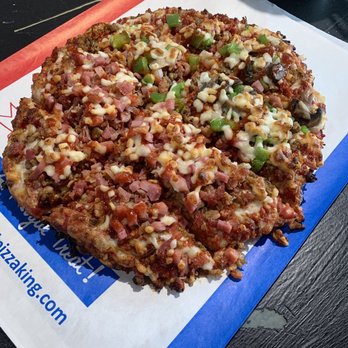 Rossville Pizza King - a pizza on a table - Pizza Near Me - Rossville, Indiana