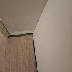 LL Flooring - Colmar - Not supposed to use pieces cut smaller then 6" pretty sure this cube in the corner doesn't match what the manufacturer guidelines are