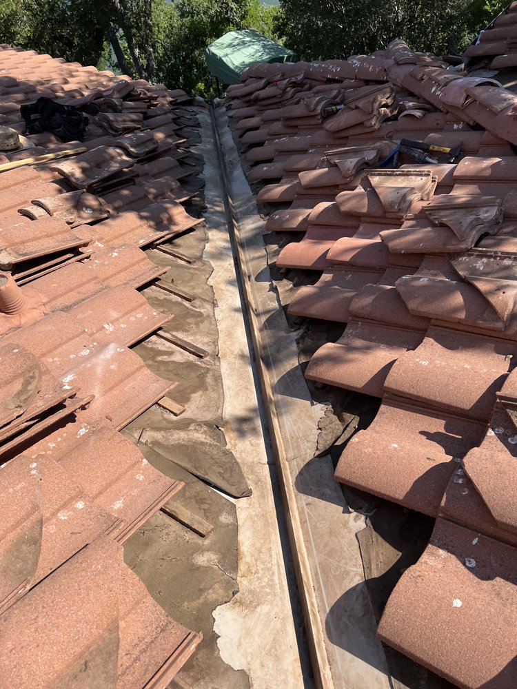 Slide of Arbiter Roofing