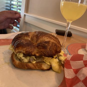 Frenchies Cafe - Breakfast Sausage Croissant - French Near Me - Key West, Florida Frenchies Cafe - Breakfast Sausage Croissant - French Near Me - Key West, Florida