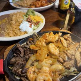 Trio fajitas plate (steak,chicken,shrimp) includes rice and beans. And fresh corn or flour homemade tortillas 10/10 Trio fajitas plate (steak,chicken,shrimp) includes rice and beans. And fresh corn or flour homemade tortillas 10/10