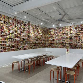 The Ramyun Library - a long table in front of a wall of books - Ramen Near Me - Carrollton, Texas The Ramyun Library - a long table in front of a wall of books - Ramen Near Me - Carrollton, Texas