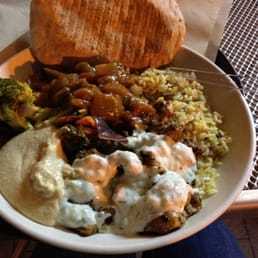 Chicken roti plate with yogurt sauce, eggplant, hummus, veggies, rice and naan! Chicken roti plate with yogurt sauce, eggplant, hummus, veggies, rice and naan!