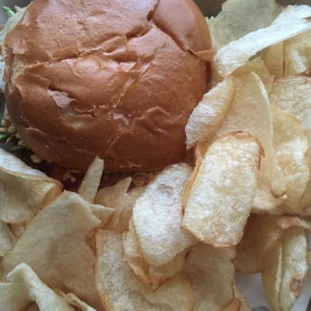 Commonwealth - The pesto parmesan.  Grilled chicken, parm disc, pesto, spinach, tomato.  House made chips.  A winner. - Beer Bar Near Me - Modesto, California