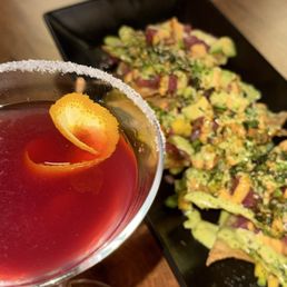 Pomegranate martini and nachos Pomegranate martini and nachos