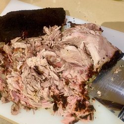 Down Island Que - Pulled-pork smoked over Mesquite hardwood low-and-slow for up to 14 hours. Available on sandwiches, as a family meal, or by the pound.
