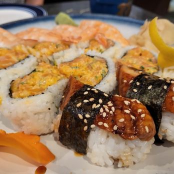 Sushi Miyagi - back (ebi nigiri), middle (spicy crunchy salmon maki), front (ebi nigiri) - Sushi Bars Near Me - Houston, Texas Sushi Miyagi - back (ebi nigiri), middle (spicy crunchy salmon maki), front (ebi nigiri) - Sushi Bars Near Me - Houston, Texas
