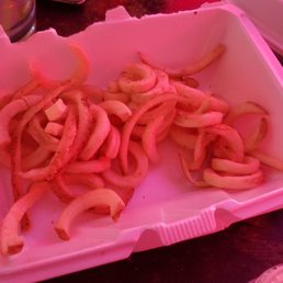 french fries in a pink container
