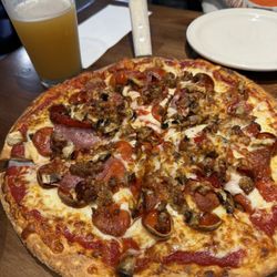 My Little Brothers pizza. We traded out the onions and red peppers for Mama Lil's.