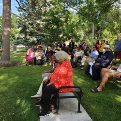 International Peace Gardens - Jan Saeed offers a Bahai prayer at the Community Vigil.