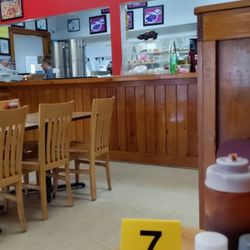 Marie's BBQ House - Counter, staff, condomints, and my lucky number for ribs